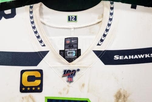 Russell Wilson Çerçeveli Oyun Kullanılmış Seattle Seahawks Kaptanın Yaması ve NFL 100 Logolu Beyaz Nike Forması İmzasız